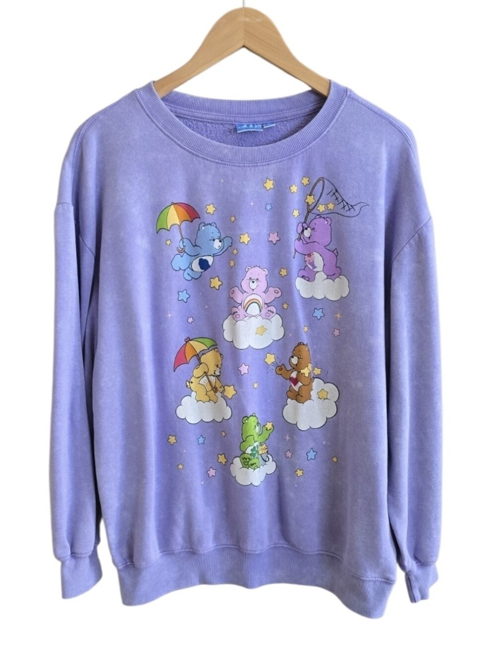 Care Bears Women's Light Purple Colorful Cozy Crewneck Sweatshirt. Size Medium